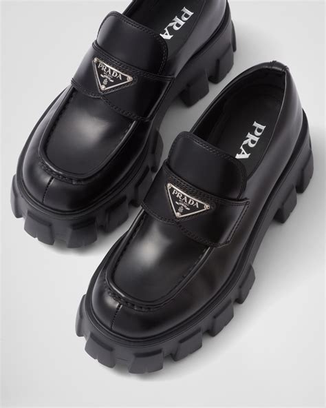 logo penny loafer prada|Prada monolith loafers women's.